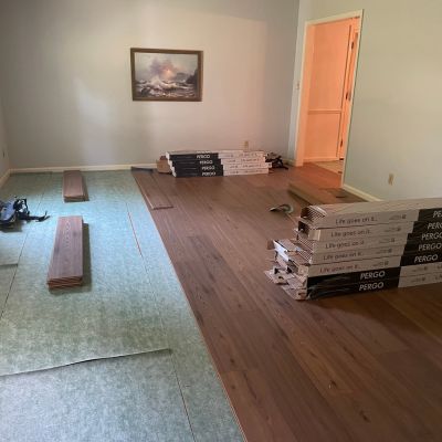 Witlock Saddleback Hickory Mohawk laminate flooring being installed by Brentwood Flooring America