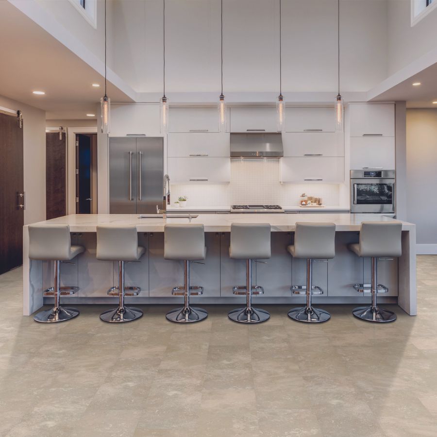 Luxury Vinyl flooring in kitchen, big counter, 6 stools.